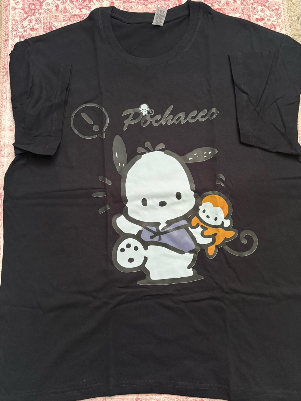 Caribbean Black Pochacco Graphic Tee with Orange Accent